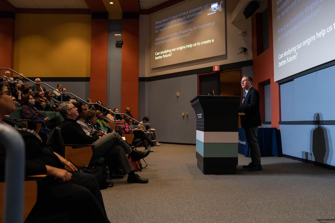 Caleb McDaniel speaking at Scientia lecture